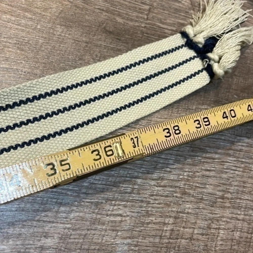 Natural fiber handcrafted loom woven tan and navy belt fits up to 38 inches